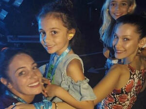 Family: Bella Hadid couldn't help but gush over her 'beautiful' family while taking them to see her beau the Weeknd perform in their hometown of Dubai on Friday (Source: bella hadid - Instagram)