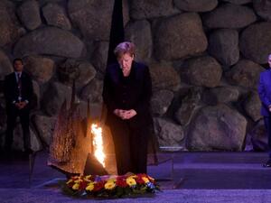 Angela Merkel lays a wreath in commemoration of Holocaust victims at Yad Vashem Memorial in Israel on October 4th 2018 (AFP) Angela Merkel lays a wreath in commemoration of Holocaust victims at Yad Vashem Memorial in Israel on October 4th 2018 (AFP)