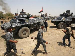 The bomber opened fire on Sunni tribesmen manning a checkpoint in al-Kasara (AFP/File Photo)