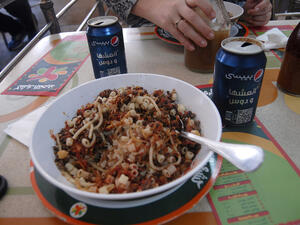 Koshari, the national dish of Egypt,  is a tasty blend of rice, lentils, pasta and chickpeas all in one meal. (Image: Flickr user Kris Fricke)