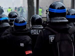 French police union bosses threatened their own 'Blue Vests' if President Emmanuel Macron fails to listen to their calls for a halt to planned cuts to the police force (AFP)