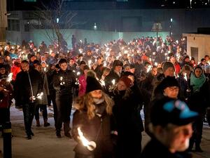 Between 500 and 1000 people attended the event, after which the local Red Cross opened its doors to allow people to receive counselling if they wished to (AFP)