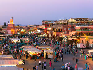 ourists and locals on the Djemaa-el-Fna square during sunset in Marrakesh (Shutterstock)
