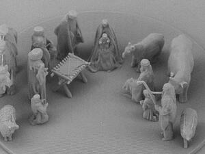 This nativity scene is so small it can fit inside the eye of a needle – invisible to the naked eye. But with a microscope the scene in all its intricate details is revealed (dailymail)