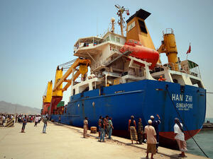 A UN aid ship at Aden's devastated port. (AFP/WFP)
