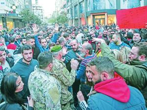 150 people gathered in central Beirut and chanted slogans against Lebanon’s politicians, calling them “corrupt.” (AFP)