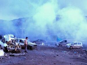 Hatay near the border between Turkey and Syria shows the scene after a car explosion. AFP PHOTO/IHLAS NEWS AGENCY TURKEY OUT