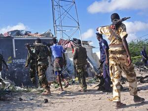 Members of the Somalian military forces stand at the site of a suicide Attack. (AFP/ File Photo)
