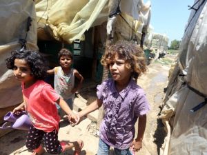 Syrian refugee children at a refugee camp in the area of Zahrani, south of the Lebanese capital Beirut. (AFP/Joseph Eid) 