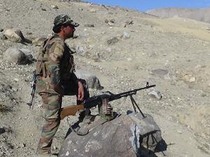 An Afghan security officer holds his position during a clash with Daesh militants in the Nangarhar province. (AFP/File)