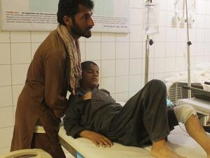 An Afghan resident is treated at a hospital following an air strike in Kunduz on April 2, 2018. (AFP)