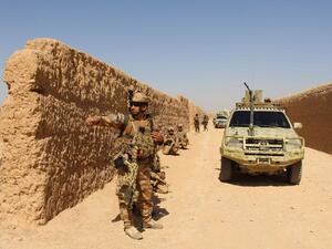 Afghan National Army commandos take position during a military operation in Helmand province on October 9, 2016. (AFP/Noor Mohammad)