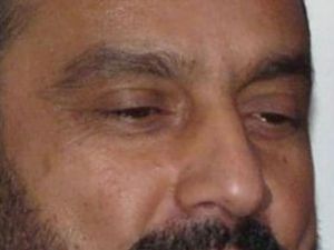 صورة غير محددة التاريخ لحاكم قندوز محمد عمر في مكتبه
