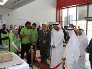 Al-Bayt Al-Kamel students team explain for Sultan bin Jamal bin Saqr Al Qasimi about their 3D model.