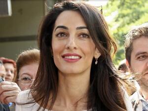 The human rights lawyer is going Down Under in October. (File photo)