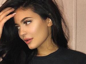 The 20-year-old reality star commanded attention as she flaunted her toned tummy in a cropped tee with the caption: 'B-day collection launching August 6th!' (Instagram)