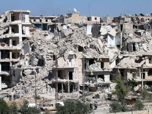 Heavily damaged buildings in the neighbourhood of Bani Zeid on Aleppo's northern outskirts. (AFP/George Ourfalian)
