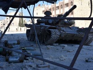 Syrian forces advance into the Masaken Hanano district of eastern Aleppo (AFP/George Ourfalian)