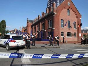 Police stand as they secure the area around a police building in the southern Belgian city of Charleroi following a machete attack. (AFP/File)