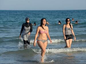 Dozens of French resorts have banned beachwear that "conspicuously" shows a person's religion such as a "burkini" -- a full-body swimsuit for Muslim women. (AFP/Fethi Belaid)