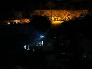 Israeli soldiers wait next to their vehicles in the West Bank village of Dura near Hebron on August 30, 2016. (AFP/Hazem Bader) 