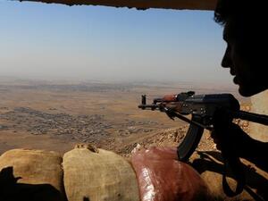 Iraqi Kurdish Peshmerga fighters hold a position on the top of Mount Zardak, east of Mosul, October 6, 2016. (AFP/File)