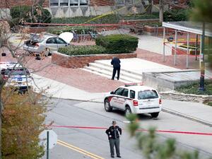 View photos
Police investigate the scene where an individual used a car to crash into a group of students outside of Watts Hall on the Ohio State University campus on November 28, 2016. (AFP/Kirk Irwin)