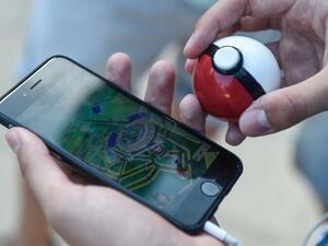 The new mobile app, which is based on a 1990s Nintendo game, has created a global frenzy as players roam the real world looking for cartoon monsters (AFP/Josep Lago)