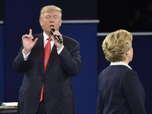 Republican presidential candidate Donald Trump makes a point to Democratic presidential candidate Hillary Clinton during the second presidential debate at Washington University in St. Louis, Missouri on October 9, 2016. (AFP/Paul J. Richards)