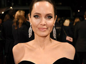 Angelina and Jennifer's choice of wearing black gowns saw them standing in solidarity with the Time's Up movement, which has been a dominant theme at Hollywood awards shows this season. (Source: David Fisher - Shutterstock)