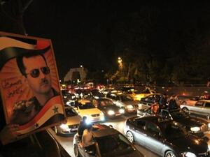 مسيرة مؤيدة للرئيس السوري بشار الأسد.