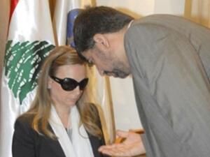 فيسبوك:صورة تظهر زوجة المقتول وسام الحسن تتجاهل السفير الايراني