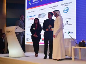 Arjun receiving the award from Mr Saeed Al Marri( Deputy CEO of Dubai SME)
