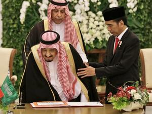 Jakarta and Riyadh also inked an agreement that builds on an existing $6 billion deal between state-owned energy firms Aramco and Pertamina to expand an Indonesian oil refinery.  (AFP/Achmad Ibrahim)