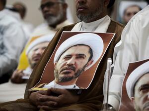 A Bahraini man holds a placard bearing the portrait of Sheikh Ali Salman, head of the Shia opposition movement Al-Wefaq, during a protest against his arrest outside Manama. (AFP/Mohammed al-Shaikh) A Bahraini man holds a placard bearing the portrait of Sheikh Ali Salman, head of the Shia opposition movement Al-Wefaq, during a protest against his arrest outside Manama. (AFP/Mohammed al-Shaikh)