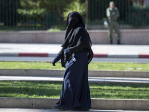 Government lawyers expect the law to prevail because it requires people to show their faces for identification purposes (AFP/File)