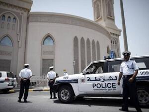 Bahraini police wait outside a mosque. (AFP/File)