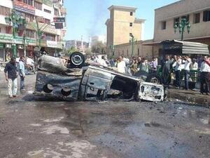 A truck is destroyed after protests by Pro Morsi followers face resistance from the Egyptian government.