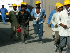 In the UAE, 43% of migrant workers view life insurance as an important investment, yet 79% remain uninsured. (AFP/ File)