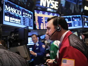 As investors wait for the Federal Reserve's policy-making committee to conclude its two-day meeting, the Dow Jones industrial average, S&P 500 and the Nasdaq all declined 0.4% in morning trading. (Photo by Spencer Platt/Getty Images) 