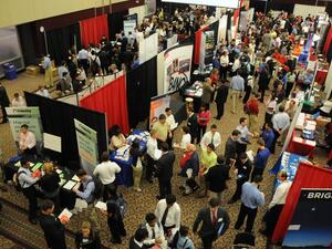 Arrive early for set up and be less intimidating by standing in front of, or beside the table. (LinkedIn)