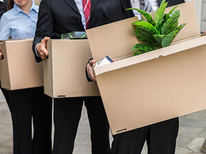 Some institutions in Lebanon are paying half a salary to their staff while others resort to arbitrary layoffs with no compensation. (Shutterstock)