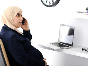 The new law also allows women to leave the workplace for two hours daily to take care of their babies for one year from the date of delivery. (Shutterstock)