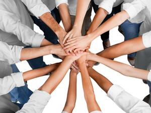 Working in a team improves personal communication skills and helps exchange of information. (Shutterstock)