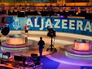 The job losses could happen as early as next week, according to an Al Jazeera manager.  (Erem)