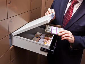 The report did not disclose the names of the individuals or groups whose bank accounts were frozen, their nationalities, or amounts. (Shutterstock)