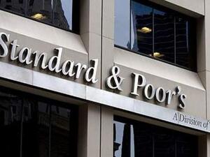 Despite two downgrades, Saudi Arabia's rating is still investment grade. (AFP/File)