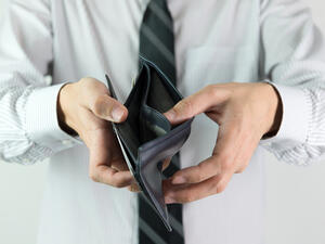 Even those at the upper end of the pay scale are having trouble setting aside a portion of their incomes for savings and investments. (Shutterstock)