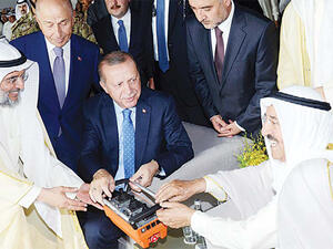 The Emir of Kuwait Sheikh Sabah Al-Ahmed Al-Jaber Al-Sabah and Turkish President Recep Tayyip Erdogan lay the foundation stone for construction of the new terminal at Kuwait International Airport in Kuwait City on May 9, 2017. (AFP)