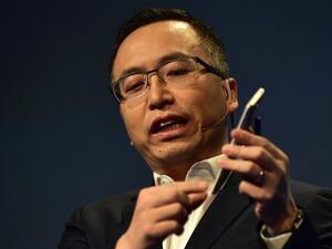George Zhao, president of Honor, holds the newly introduced Honor 6X phone during the company's press conference at CES2017 in Las Vegas. (AFP/Frederic J. Brown)